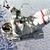 The Weightless Environment Brings Special Challenges To Astronauts. Mark Lee Tetherless and Free
