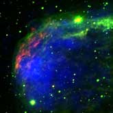 NASA's Chandra X-ray Observatory data (blue) and optical observations (green and red) reveal the region around a doomed massive star called HD 192163.