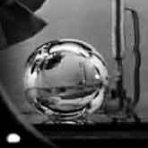 Without buoyancy, the vapor produced by boiling simply floats as a bubble inside the liquid after the heating has stopped. Surface tension effects cause the many small bubbles produced to coalesce into one large sphere.