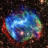 A composite Chandra X-ray (blue) and Palomar infrared (red and green) image of the supernova remnant W49B.