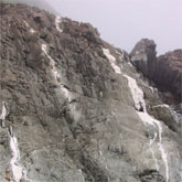 Metamorphic rocks smoothed by the surf at West Quoddy Head.