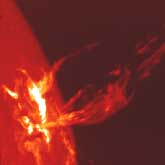 A solar flare with an eruptive prominence on the limb of the sun.
