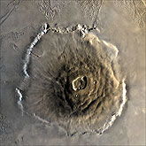 The largest known volcano in the solar system, Olympus Mons.