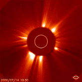 The SOHO spacecraft recorded this CME on July 14, 2000. High-energy particles accelerated by the blast peppered the spacecraft's camera and clouded its view.